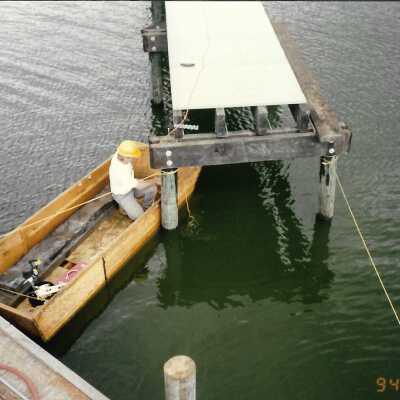 Construction of boardwalk over Oso Flaco Lake, 1994 - 3.5" x 5" color photograph