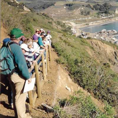 View from Pecho Coast Trail above Port San Luis Pier, The Nature Conservancy hike, in photo album from Joyce Hall - Undated 3.5" x 5" color photograph