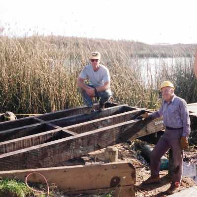 Construction of boardwalk over Oso Flaco Lake, 1994 - 3.5" x 5" color photograph