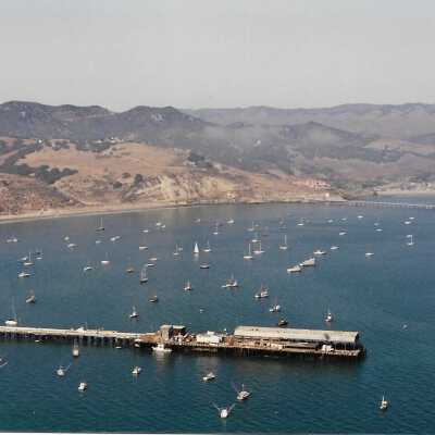 Port San Luis Pier from Pecho Coast Trail, The Nature Conservancy hike, in photo album from Joyce Hall - Undated 3.5" x 5" color photograph