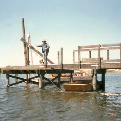 Bridge construction 1994. Ray Folch and spectator on bridge.