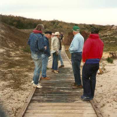 Bridge construction 1994. Chuck Warner, Jim Neuschwander, Ken Jenkins, Pete St. John, and  Dick Williams standing on the damaged bridge caused by a smaoker. Bridge Crew put fire out.