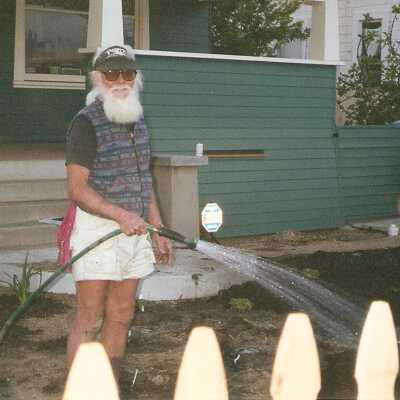 Dunes Discovery Center garden Al Naydol's plant class landscaping front yard 4/01. Bill Deneen with hose.