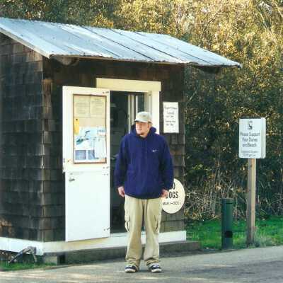Center for land management staff photos 12/2000. David Friesen greets visitor at Main St. entrance.