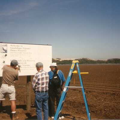 Installation of signs on beaches 3/1996. Dick Williams, Pete St. John, Jim Neuschwander, and Frank Perez at Oso Flaco Lake.