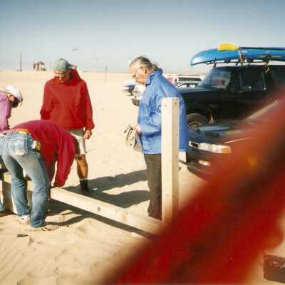 Installation of signs on beaches 3/1996. Gerda Perez, Chuck Warner, Pete St. John, and Frank Perez at Guadalupe Beach.