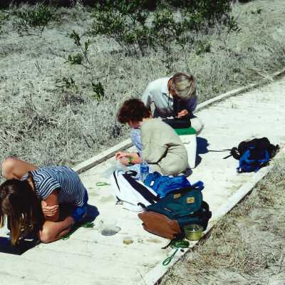 Undated 4" x 6" color photograph of Theresa Hoffman and two children on the Oso Flaco Boardwalk