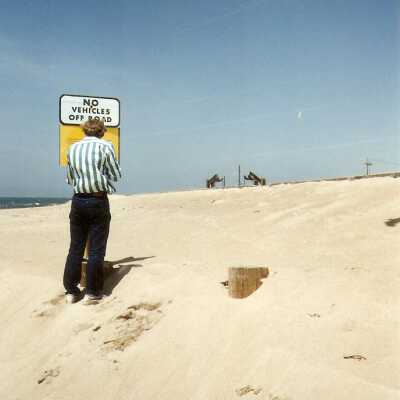 Sign on Guadalupe Beach explaining Unocal's contamination of water, air, and sand due to diluent leakage