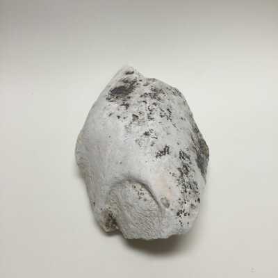 Black painted statue plaster, little toe of seated pharaoh statue, main gate, Ten Commandments