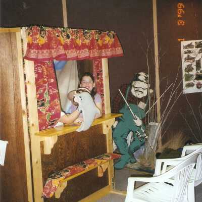 Dunes Discovery Center visitor in the puppet theater 1/99.