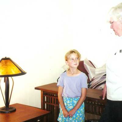 Premier of reptile C.D. 7/1999. Dunes Discovery Center visitors with docent Naomi Hoffman with young Miss Carr.