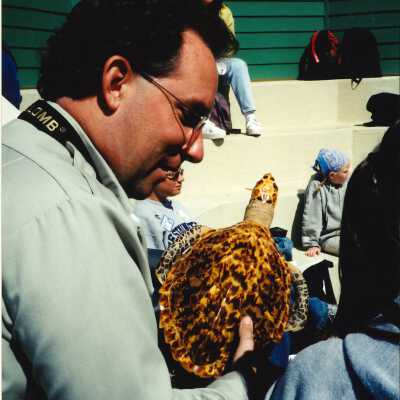 Chris Barr, US Fish and Wildlife Service with an unspecified Elementary School Field Trip 2001; 4" x 6" color photograph