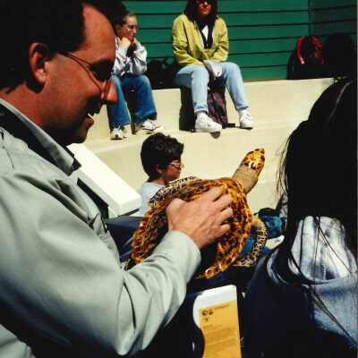 Chris Barr, US Fish and Wildlife Service with an unspecified Elementary School Field Trip 2001; 4" x 6" color photograph