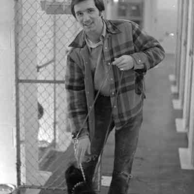 Unidentified man and dog, Humane Society, Date unknown: Frame 12
