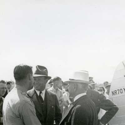 Frank Fuller, Jr. visits Olympia Airport to promote Golden Gate Expo, 1939