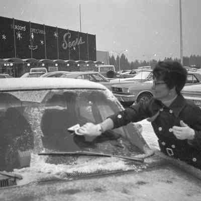 Unidentified woman, Sears parking lot, 1972: Frame 13