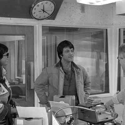 Unidentified people and P. J. Kirkland, Radio Studio, Date unknown: Frame 8b
