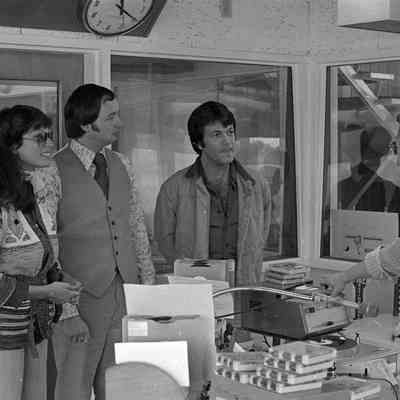 Unidentified people, Dick Pust, and P. J. Kirkland, Radio Studio, Date unknown: Frame 9b