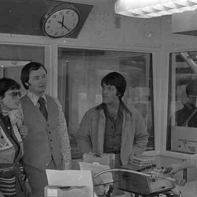 Unidentified people, Dick Pust, and P. J. Kirkland, Radio Studio, Date unknown: Frame 12b