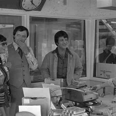 Unidentified people, Dick Pust, and P. J. Kirkland, Radio Studio, Date unknown: Frame 13b