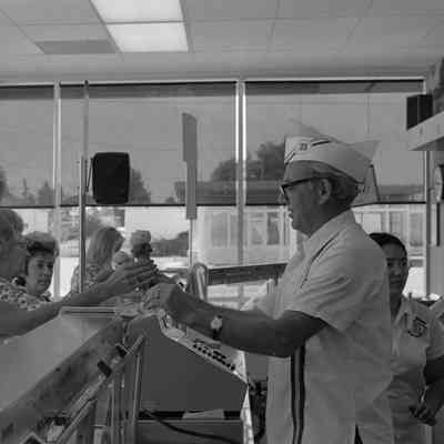 Fred Hulbert Serving Ice Cream.
