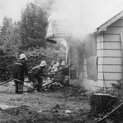 Firefighters putting out fire, Date unknown: Frame 8