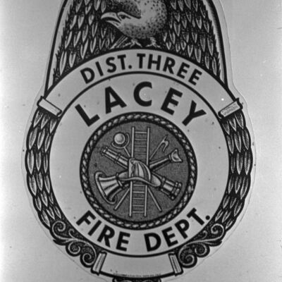 Lacey Fire Dept. crest, Date unknown: Frame 19a
