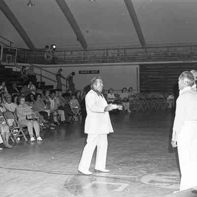 Unidentified choir and Unidentified spectators, MAD Festival, Marcus Pavilion, St. Martin's University, 1976: Frame 37e