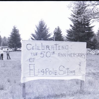 Flagpole Sitting sign, 1974: Frame 31