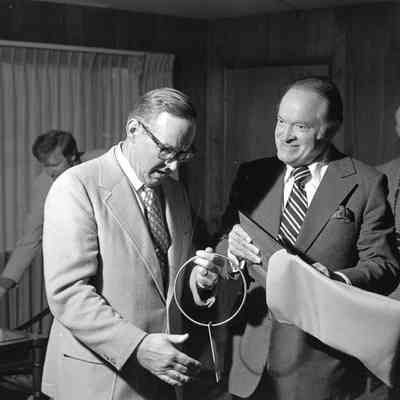 Bob Hope and Unidentified men, Tyee Hotel, Tumwater, Washington, Date unknown: Frame 39