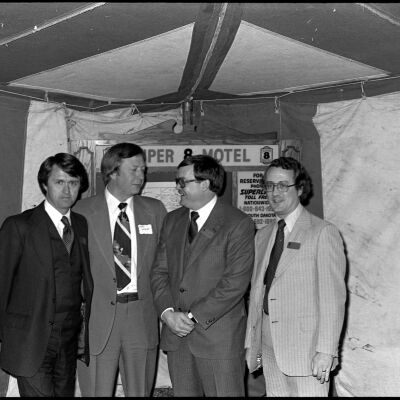 Unidentified men and Larry Knudsen, Super 8 Motel, January 17, 1980: Frame 2