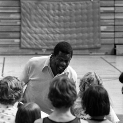 Bill Russel and Unidentified people, July 30, 1975: Frame 43