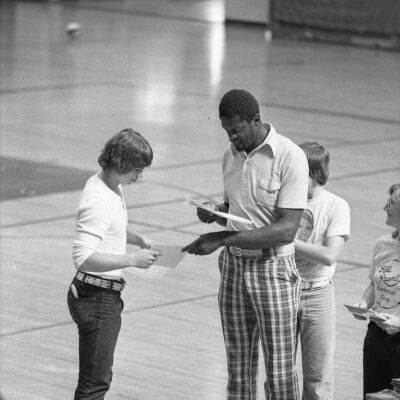 Bill Russel and Unidentified people, July 30, 1975: Frame 37