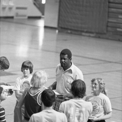 Bill Russel and Unidentified people, July 30, 1975: Frame 38