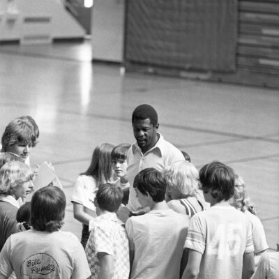 Bill Russel and Unidentified people, July 30, 1975: Frame 39