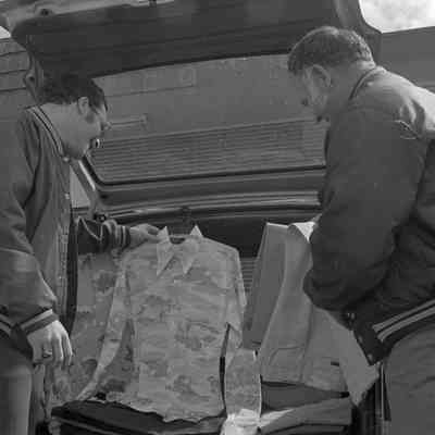 Unidentified men, Lacey Leader Office parking lot, Date unknown: Frame 42