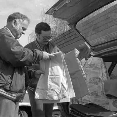Unidentified men, Lacey Leader Office parking lot, Date unknown: Frame 43
