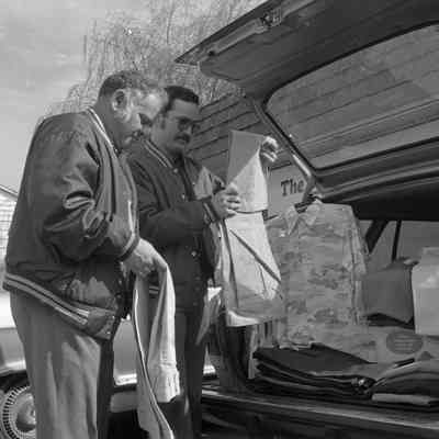 Unidentified men, Lacey Leader Office parking lot, Date unknown: Frame 44