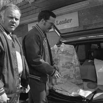 Unidentified men, Lacey Leader Office parking lot, Date unknown: Frame 2
