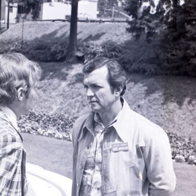 Hershel McGriff and unidentified man, 1975: Frame 16