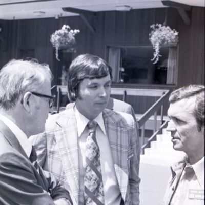 Hershel McGriff and unidentified men, 1975: Frame 19