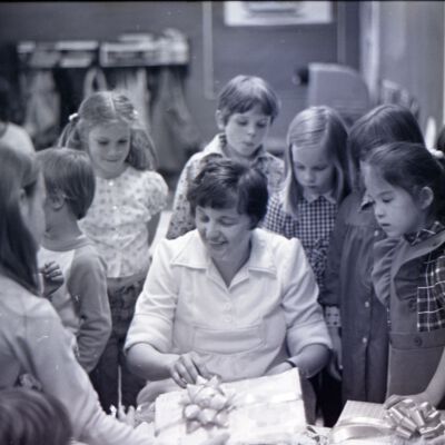Unidentified woman and children, 1976: Frame 16