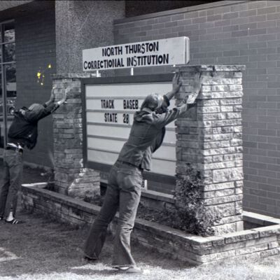 Unidentified men, 1976: Frame 1
