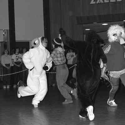 Unidentified mascots and Unidentified people, Mascot Expo, 1981: Frame 42