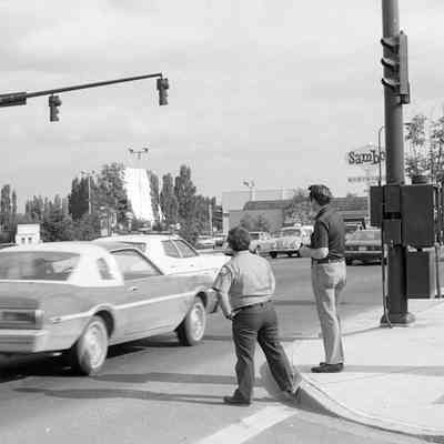 Unidentified men, corner of Sleater Kinney Road and 6th Ave., Lacey, Washington, Date unknown: Frame 5