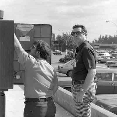 Unidentified men, corner of Sleater Kinney Road and 6th Ave., Lacey, Washington, Date unknown: Frame 2