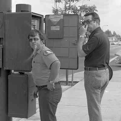 Unidentified men, corner of Sleater Kinney Road and 6th Ave., Lacey, Washington, Date unknown: Frame 3