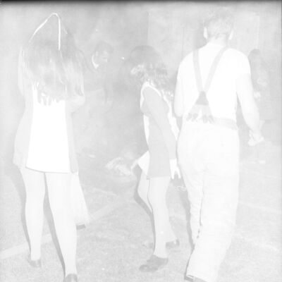 Unidentified firefighter and Unidentified cheerleaders, Timberline High School, October 17, 1972: Frame 13