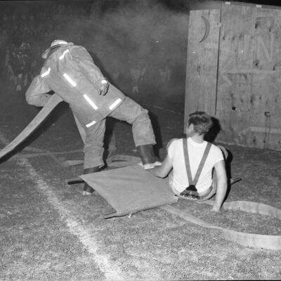 Firefighters putting out a fire, Timberline High School, October 17, 1972: Frame 15