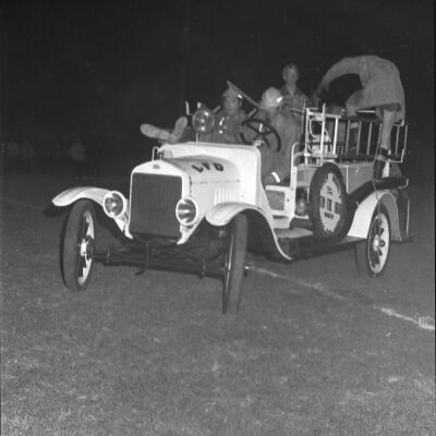 Firefighters in firetruck, Timberline High School, October 17, 1972: Frame 20